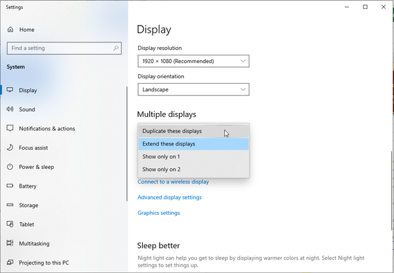 A window of the "Displays" setting on Windows OS. Under Multiple displays section, "Extend these displays" is highlighted.