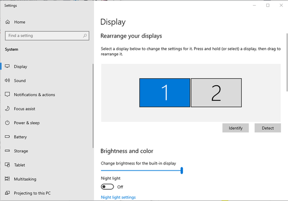 A window of the "Displays" setting on Windows OS that shows the "Rearrange your displays" option. There are two screens detected, labeled 1 and 2.